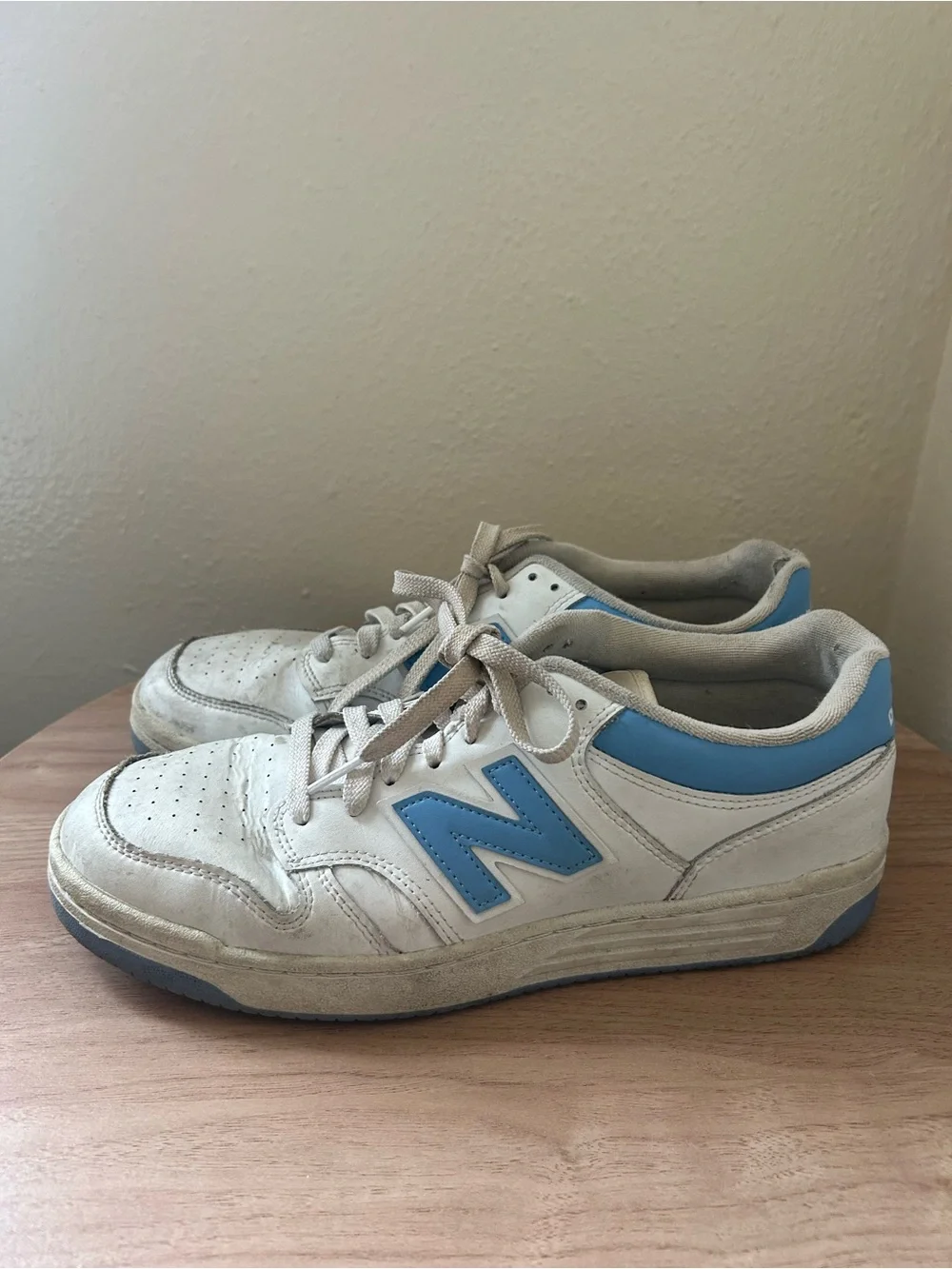New Balance White Leather Sneakers with Light Blue Logo